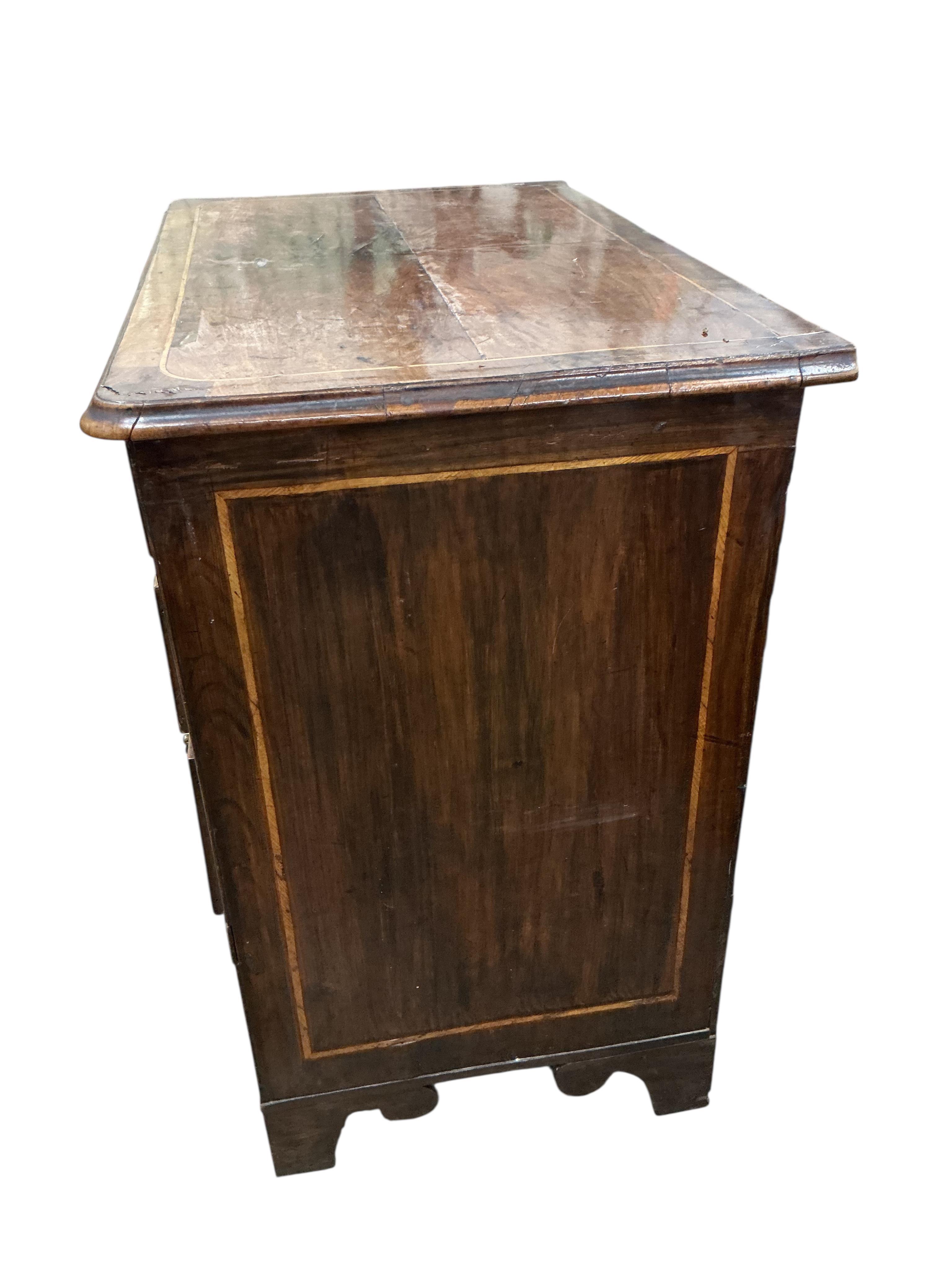 An 18th century walnut kneehole desk, width 79cm, depth 49cm, height 84cm